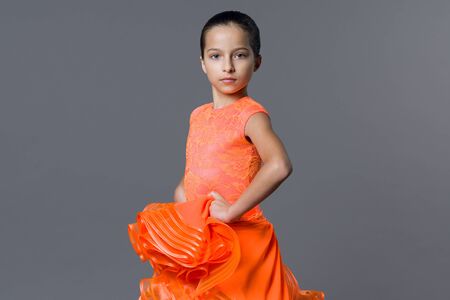 Portrait of a girl child 9-10 years old dancer. Sports ballroom dancing, latino.の写真素材