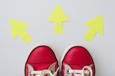 Choice, legs and 3 arrows on the road.の写真素材