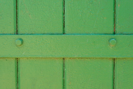 Texture background green painted cracked wood ironの写真素材