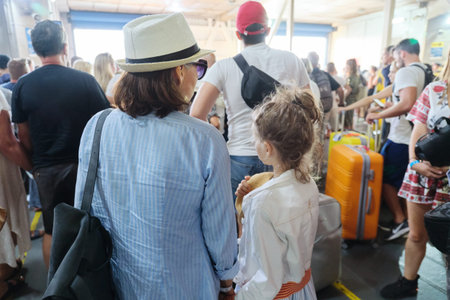 People with luggage, passengers on sea ferry awaiting departure. Sea transport, travel, tourism