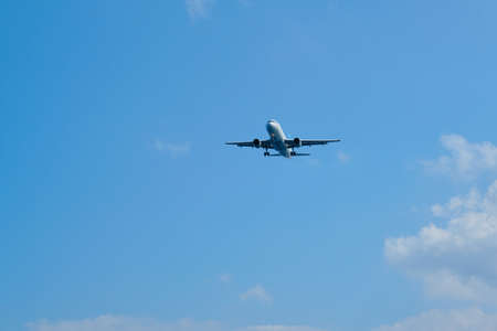 Greece Santorini, 11-09-2019. Eurowings, plane in the sky over greek famous tourist volcanic island Santorini. Air transport, tourism, travel conceptのeditorial素材