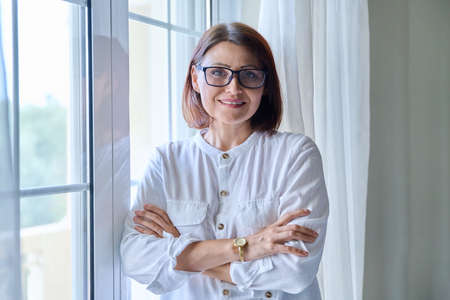 Portrait of a mature confident woman looking into the cameraの写真素材