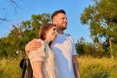 Portrait of happy adult couple on summer sunny dayの写真素材