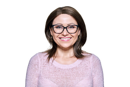 Portrait of mature smiling woman on white isolated background