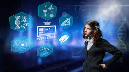 Attentive preteen schoolgirl looking at digital screen with educational symbol