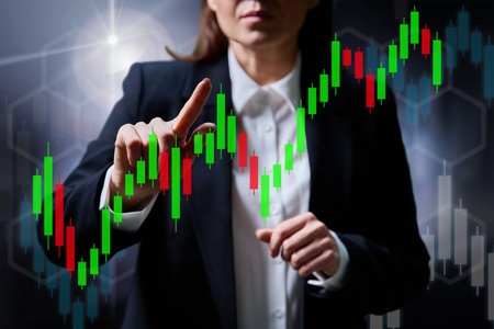 Businesswoman planning graph of economic corporate growthの写真素材
