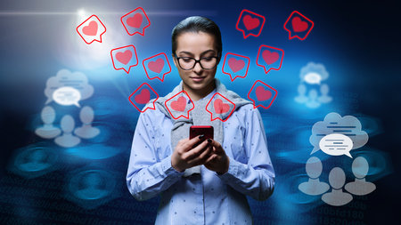 Young teenage girl using smartphone to communicate in social networks