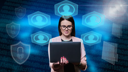 Businesswoman using laptop for business communications, service