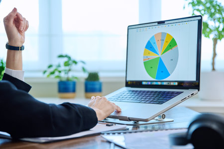 Mature serious business woman working at computer, workplace boss entrepreneurの写真素材