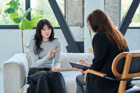 Psychology session for young female patient, professional help and supportの写真素材