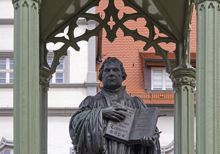 Monument of Martin Luther in Wittenberg, Germany. It was the first public monument of the great reformer, designed in 1821 by Johann Gottfried Schadow. Martin Luther was a German monk 1483-1546, theologian, and church reformer and the translator of the Biのeditorial素材