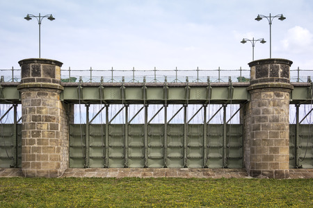 The Pretzien Weir near the village of Pretzien is part of a dyke system to protect the cities of Magdeburg and SchÃ¶nebeck from the floods of the Elbe. After opening the weir, up to a quarter of the river Elbe can be widely crossed over Biederitz east of のeditorial素材