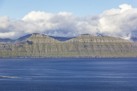 A typical situation in the Faroe Islands. High mountains and deep fjords.の写真素材