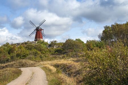 This traditional windmill stands near the Swedish skerry archipelago in the province of Bohuslan.の写真素材