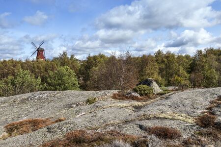 This traditional windmill stands near the Swedish skerry archipelago in the province of Bohuslan.の写真素材