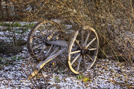 In the state of Brandenburg, Germany, you can still find many old agricultural tools, such as these old wooden wheels.の写真素材