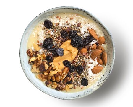 A delicious bowl as a wholesome, healthy meal with nuts and dried fruit.の写真素材