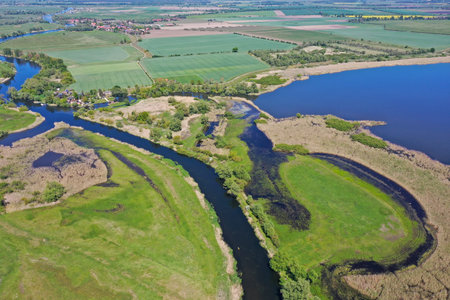 View from above on the landscape of the river Havel. In this aerial view you can see the water, the...