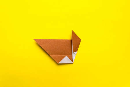 Step by step photo instruction how to make origami paper bull. The bull is the symbol of the 2020 new year. Simple diy with kids childrens concept.の写真素材