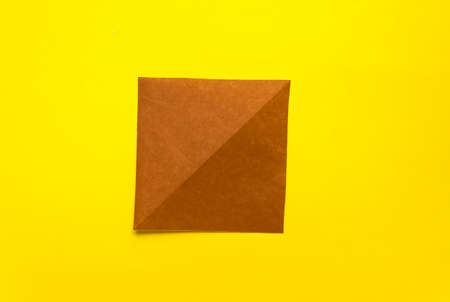 Step by step photo instruction how to make origami paper bull. The bull is the symbol of the 2020 new year. Simple diy with kids childrens concept.の写真素材