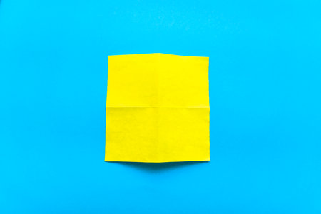 Step by step photo instruction how to make origami paper car. Simple diy with kids children's concept. Step 1.の写真素材