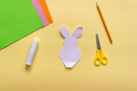 Step by step photo instruction How to make Origami paper bunny with carrot for Easter greetings card. Children's art project. DIY concept. Step 5の写真素材