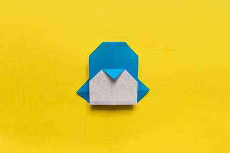 Step by step photo instruction how to make origami paper penguin. Simple diy kids childrens concept.の写真素材
