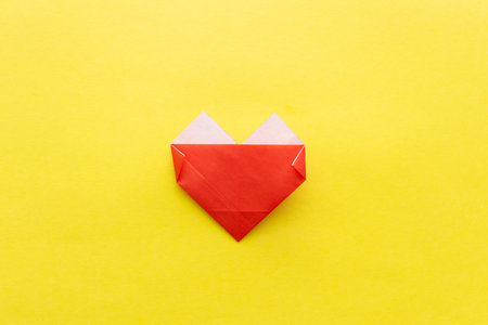 Step by step instructions how to make origami easy heart.