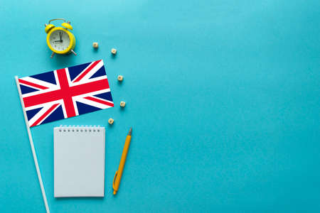 Time to learn foreign language. Flat composition for English courses with space for textの写真素材