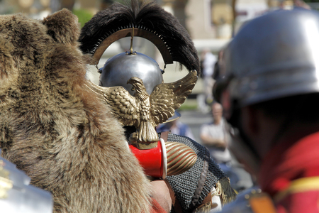 Roman aquila carried by troops aligned for battle, back viewの写真素材