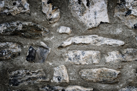 Grunge old grey stone wall texture. Abstract rock pattern concrete surface background. Masonry,...