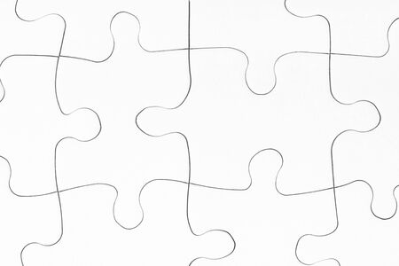 Completed puzzle jigsaw game background. Blank puzzle pieces mockup. Successful decision, solution of problem. Connection metaphor. Business teamwork, success partnership concept. Copy spaceの写真素材