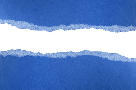 Ripped pieces of blue paper isolated on white background. Paper piece torn edge. Rip sheet paper tears. Copy space, frame, banner, trend 2020の写真素材