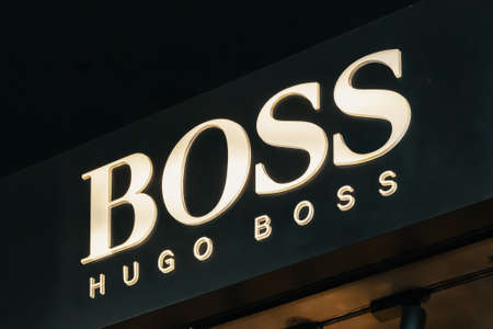 Hugo Boss logo store in Milans Fashion District, Montenapoleone area. Hugo Boss is a German luxury fashion house, produces clothing, accessories, footwear and fragrances. Milan, Italy - 24.09.2020のeditorial素材