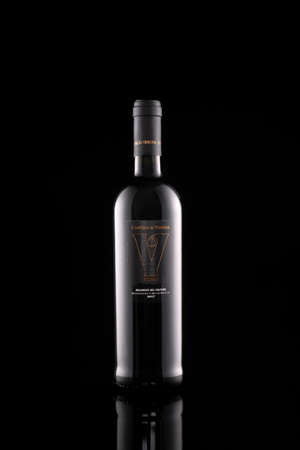 Wine Cantina di venosa bottle silhouette isolated on dark background. Studio photography.のeditorial素材