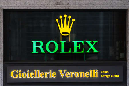 Rolex brand logo sign on a store exterior. Rolex is a Swiss luxury watch manufacturer based in Geneva, Switzerland. Como, Italy - 10.11.2019のeditorial素材