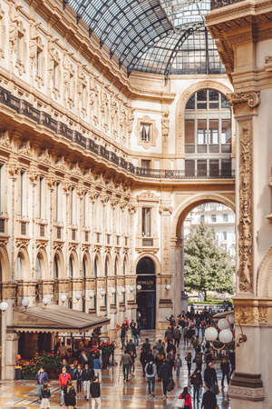People walking in mall in center of Milan city during coronavirus, covid 19 outbreak. Virus pandemic.Vittorio Emmanuele II shopping gallery. Milan, Italy - September 27, 2020のeditorial素材