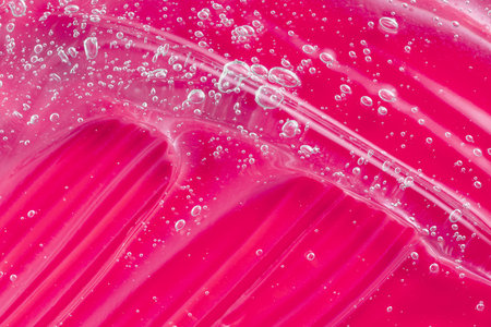 Transparent skincare product. Cosmetic gel smudge with bubble. Liquid lotion splash. Serum gel with aloe vera. Hyaluronic acid smear. Lubricant sample. Moisturiser with vitamin. Jelly textureの写真素材