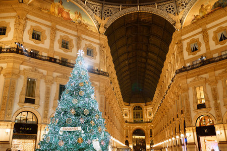 Milan, Italy - December, 15, 2020: Digital Christmas Tree Swarovski 2020 in center of the Galleria Vittorio Emanuele II in front of Swarovski boutique. Christmas tree signed by Swarovskiのeditorial素材
