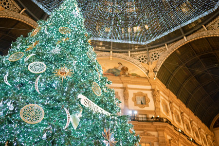 Milan, Italy - December, 15, 2020: Digital Christmas Tree Swarovski 2020 in center of the Galleria Vittorio Emanuele II in front of Swarovski boutique. Christmas tree signed by Swarovskiのeditorial素材