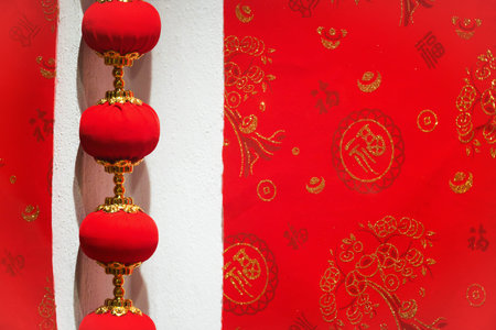 Chinese new year decorations in Chinatown. Decorations hanging on the wall.