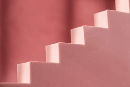 Cosmetic art deco stair podium display pedestal stand. Fashion geometric staircase backdrop for product presentation showcase. Abstract minimal template stage platform. Modern pink scene mockupの写真素材
