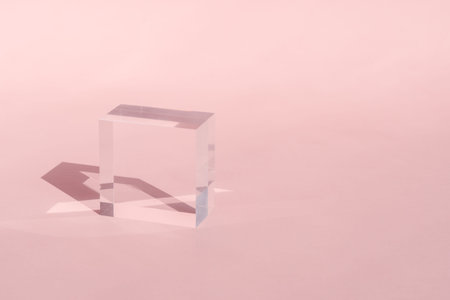 Acrylic block, podium for product presentation. Glass transparent cube with sun reflection,...