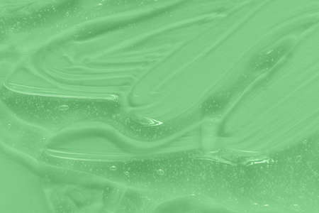 Skincare lotion face product swatch. Hyaluron acid for skin care with collagen and retinol. Serum texture, clear gel with bubbles background. Skincare beauty toner. .Cosmetic cream transparent liquidの写真素材