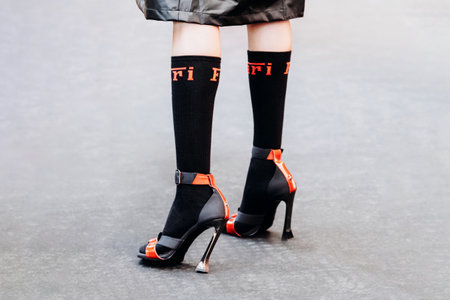 Milan, Italy - February, 27, 2022: woman wears Ferrari high heel shoes, street style detailsのeditorial素材