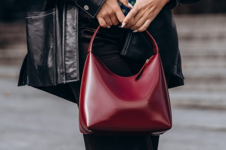 Paris, France - October, 3, 2021: woman wears handbag Mansur Gavriel leather shoulder bag, street style details.のeditorial素材
