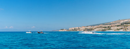 Tropea, Italy - July, 17, 2022: Beautiful seascape with sailing yachts in summer during sunny day. Travel, hobby concept.のeditorial素材