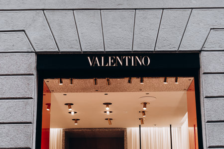 Milan, Italy - November, 13, 2021: Facade logo of fashion womens clothing store Maison Valentino. Luxury storeのeditorial素材