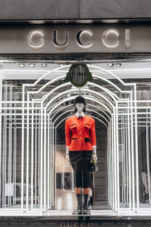 Milan, Italy - November, 13, 2021: Facade of fashion clothing store Gucci, selling clothing dresses shoes, accessories. Luxury store apparelのeditorial素材