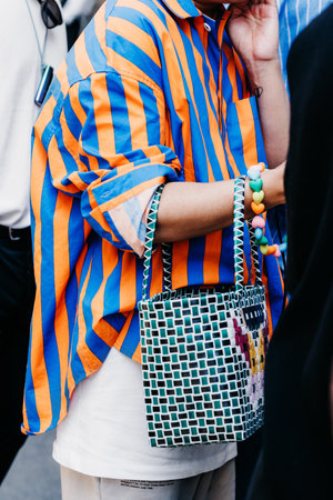 Milan, Italy - June 20, 2022: man wears Marni tote bag, menswear street style accessories.のeditorial素材